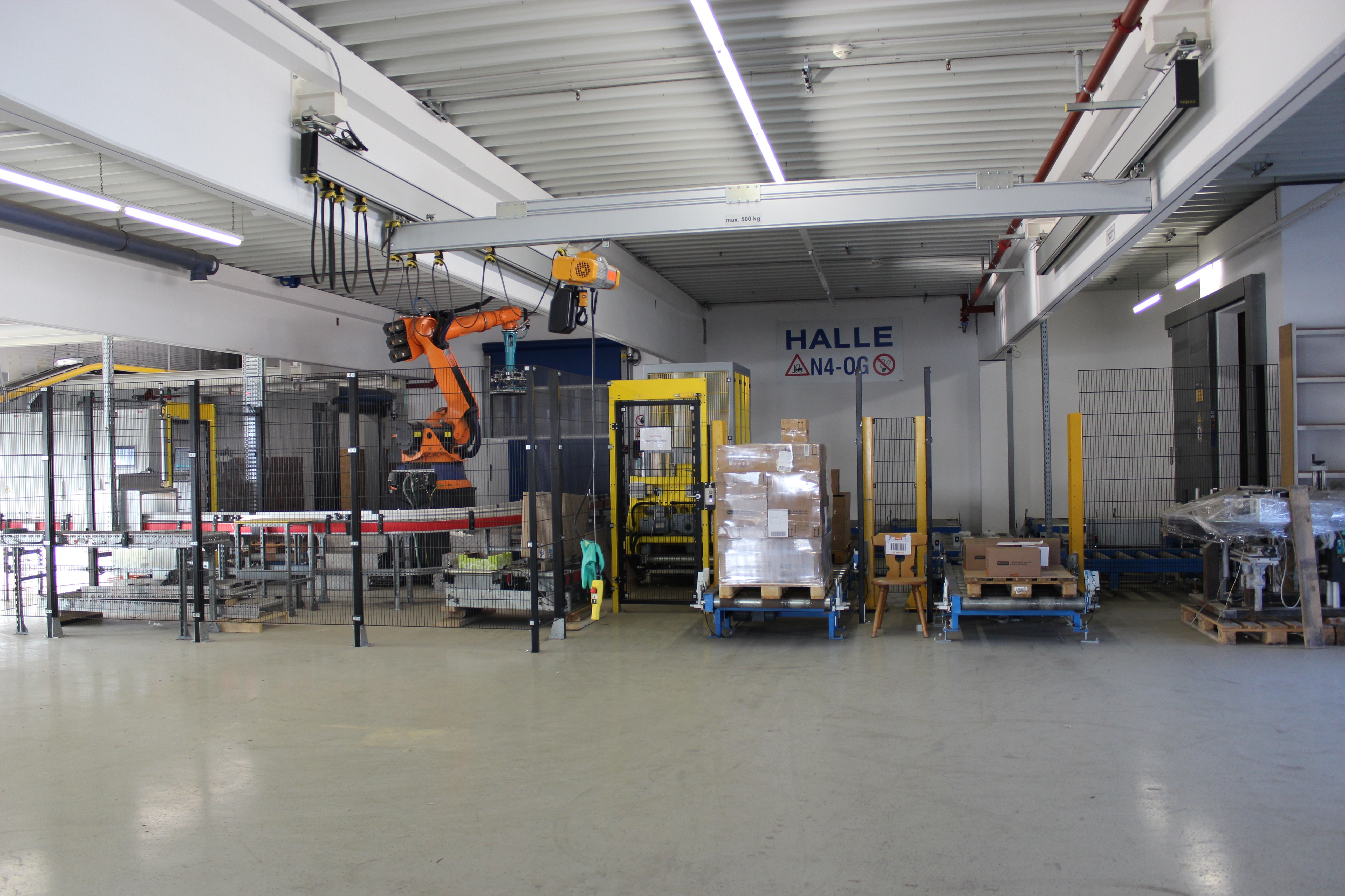 KUKA robot in warehouse hall